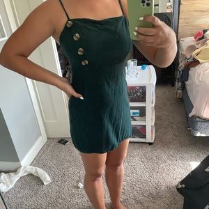 Forest green tight mini dress with buttons
